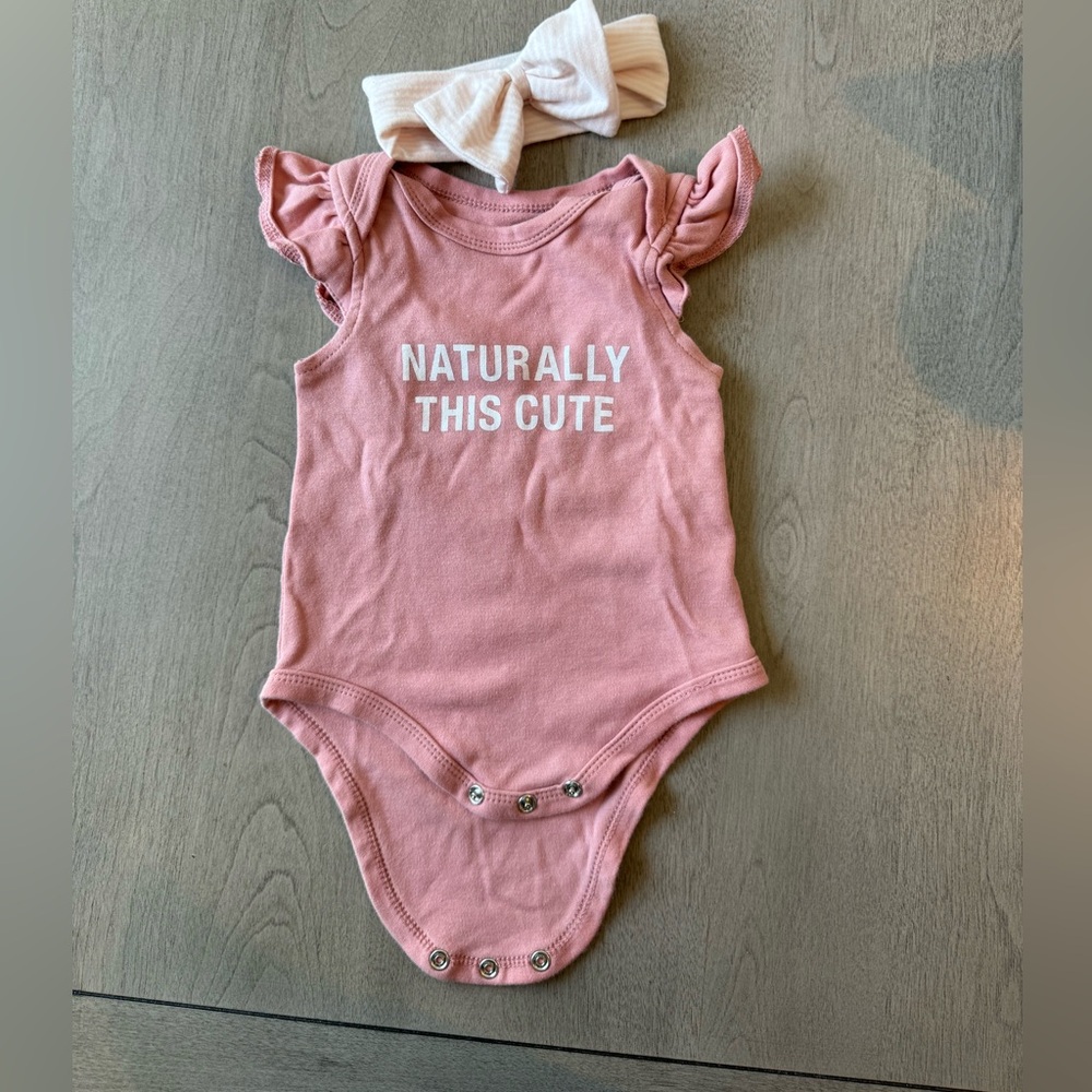Naturally this cute onsie with hair band